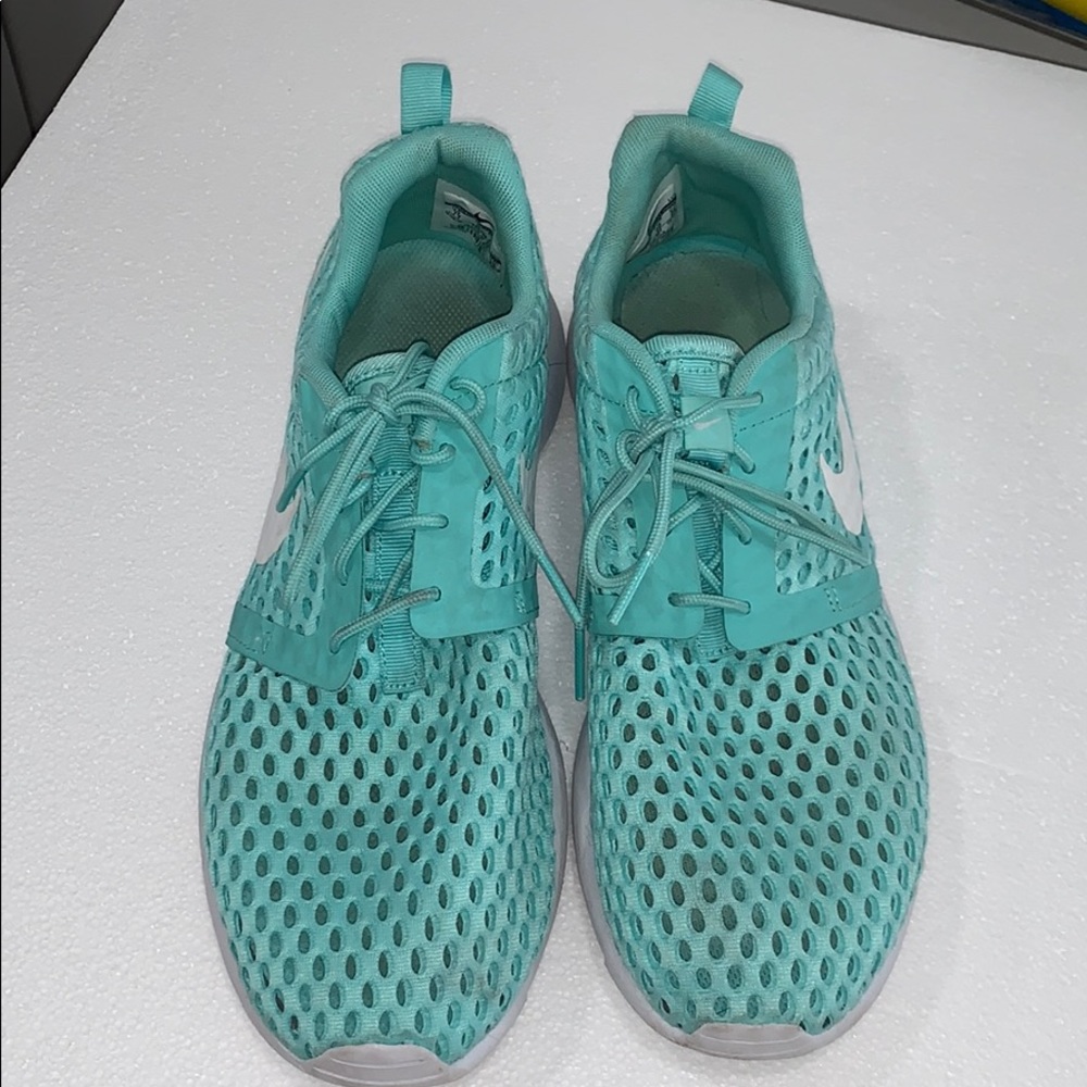 Nike youth sneakers. Fits Womans 8